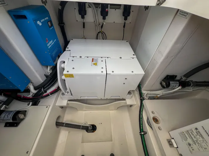  Yacht Photos Pics 2023 Tiara Yachts 38 LS engine compartment with electrical components and wiring.