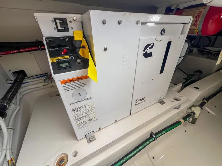  Yacht Photos Pics 2023 Tiara Yachts 38 LS engine compartment featuring an Onan generator.