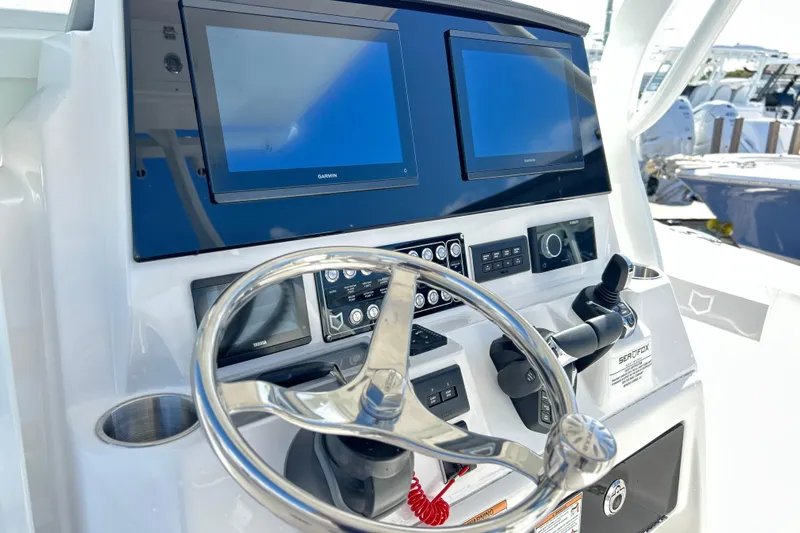  Yacht Photos Pics Helm of 2026 Sea Fox 288 Commander with dual Garmin displays and controls.