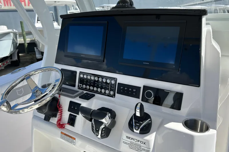  Yacht Photos Pics 2026 Sea Fox 288 Commander dashboard with dual screens and modern controls.