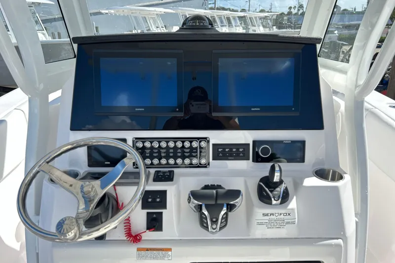  Yacht Photos Pics 2026 Sea Fox 288 Commander helm with dual Garmin displays and modern controls.