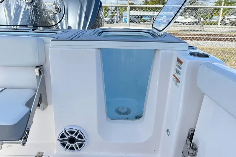  Yacht Photos Pics 2026 Sea Fox 288 Commander boat interior with livewell and seating.