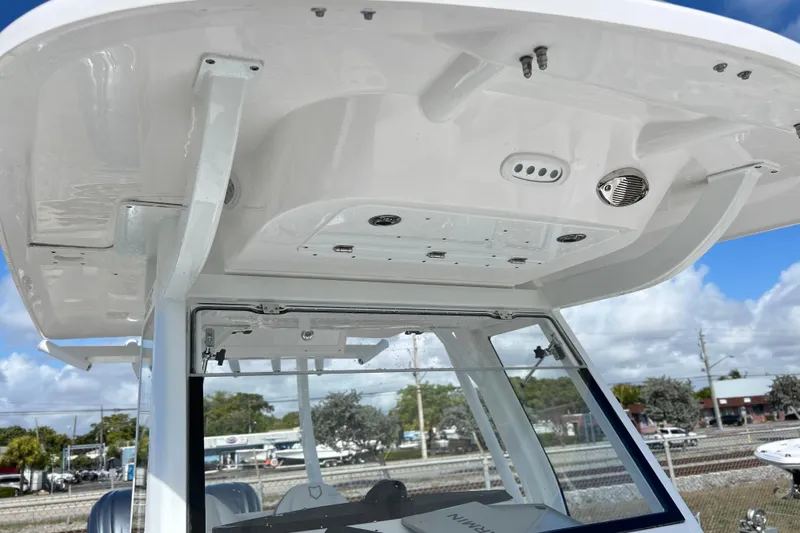  Yacht Photos Pics 2026 Sea Fox 288 Commander boat console with overhead view, featuring speakers and controls.