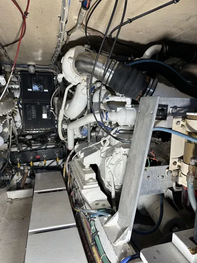 50 Hatteras Convertible Yacht Photos Pics Engine room of a 1992 Hatteras 50 Convertible yacht with visible machinery and wiring.