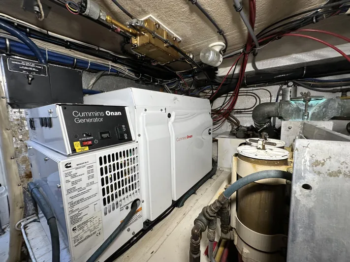 50 Hatteras Convertible Yacht Photos Pics Cummins Onan generator in the engine room of a 1992 Hatteras 50 Convertible yacht.