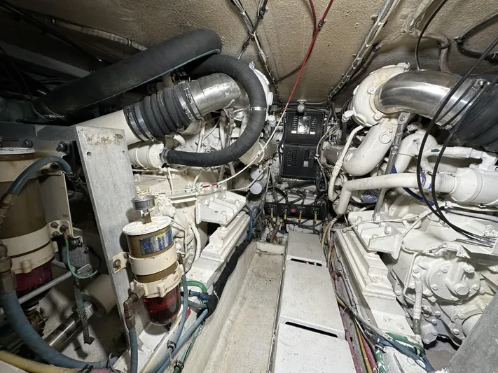 50 Hatteras Convertible Yacht Photos Pics Engine room of a 1992 Hatteras 50 Convertible yacht with twin engines.