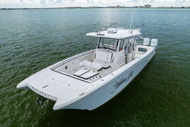 Mama Gato Yacht Photos Pics 2022 World Cat 400 CC-X boat on calm water, showcasing sleek design and spacious deck.