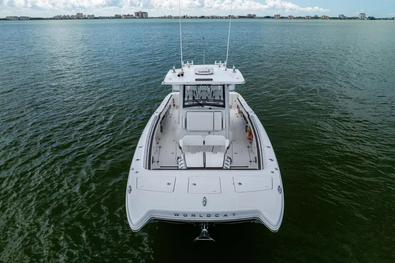 Mama Gato Yacht Photos Pics 2022 World Cat 400 CC-X boat on calm water, showcasing sleek design and spacious deck.