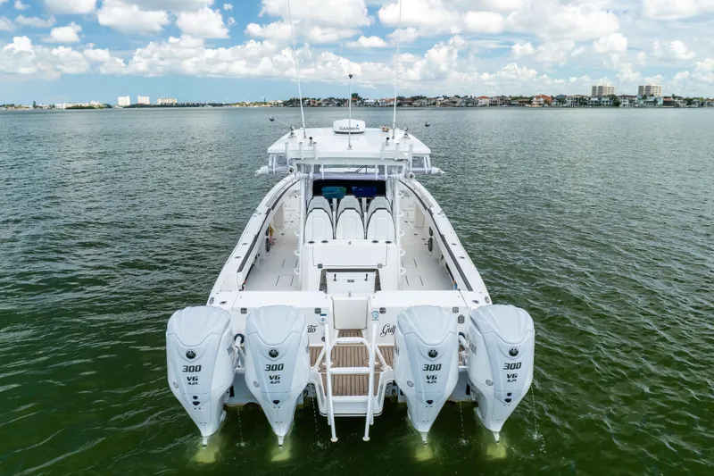 Mama Gato Yacht Photos Pics 2022 World Cat 400 CC-X boat with four powerful engines on open water.