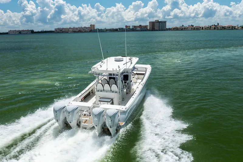 Mama Gato Yacht Photos Pics 2022 World Cat 400 CC-X cruising on open water, showcasing powerful engines and sleek design.