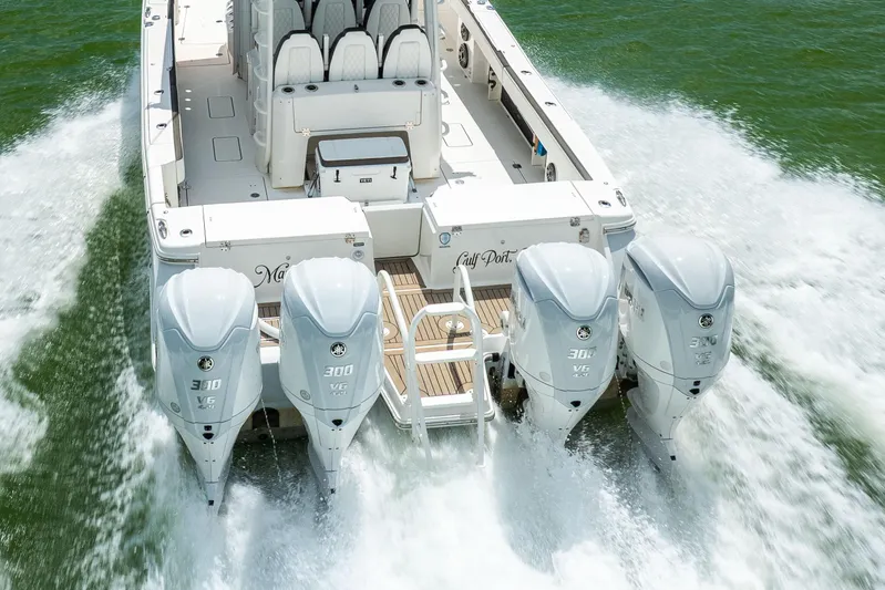 Mama Gato Yacht Photos Pics 2022 World Cat 400 CC-X boat with four powerful outboard engines on water.