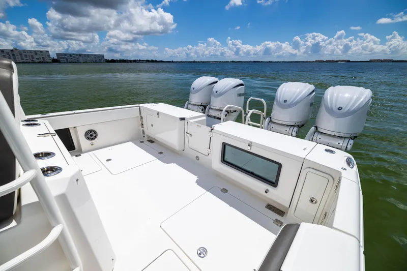 Mama Gato Yacht Photos Pics 2022 World Cat 400 CC-X boat with four engines on a sunny day.