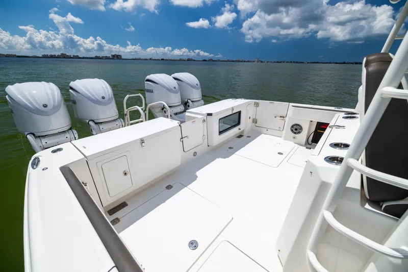 Mama Gato Yacht Photos Pics 2022 World Cat 400 CC-X boat with four engines, spacious deck, and ocean view.