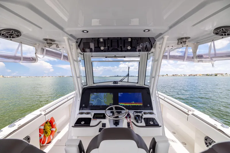 Mama Gato Yacht Photos Pics Interior view of 2022 World Cat 400 CC-X boat with advanced navigation system.