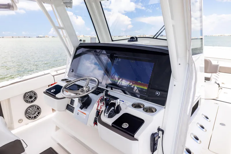 Mama Gato Yacht Photos Pics 2022 World Cat 400 CC-X helm with advanced navigation system and ocean view.