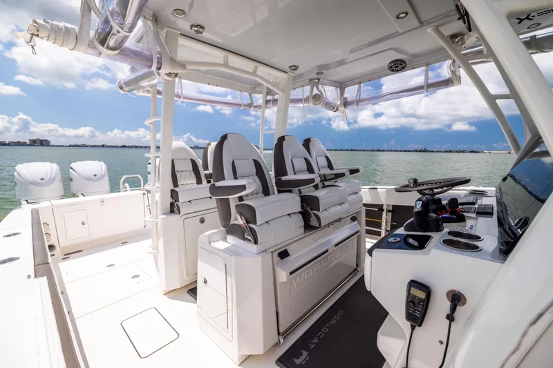 Mama Gato Yacht Photos Pics 2022 World Cat 400 CC-X boat interior with luxurious seating and modern controls.