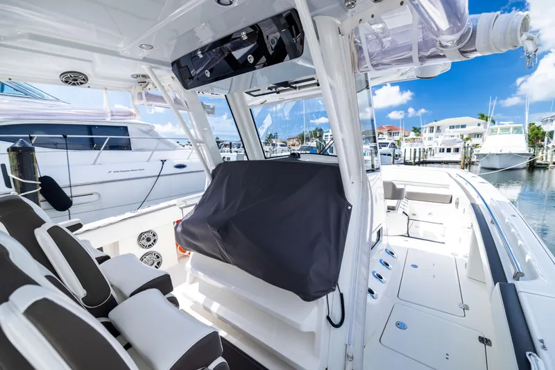 Mama Gato Yacht Photos Pics 2022 World Cat 400 CC-X boat interior at marina, featuring sleek seating and modern design.