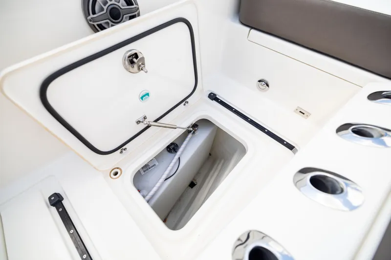 Mama Gato Yacht Photos Pics Open storage compartment on 2022 World Cat 400 CC-X boat, showcasing interior details.