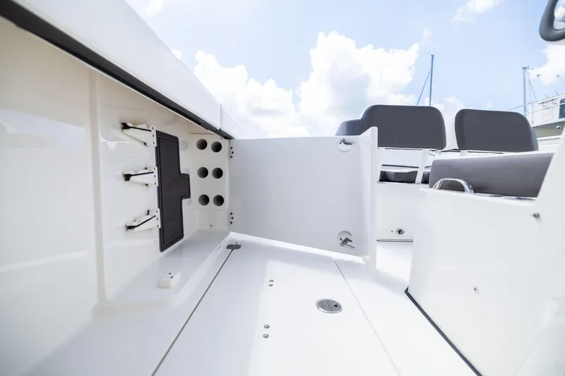 Mama Gato Yacht Photos Pics 2022 World Cat 400 CC-X boat interior with open storage compartment and seating.