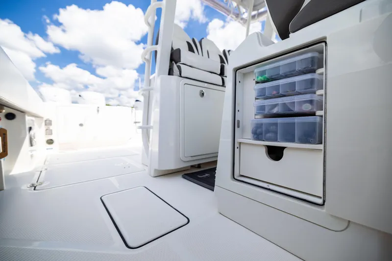 Mama Gato Yacht Photos Pics 2022 World Cat 400 CC-X boat interior with storage compartments and seating.