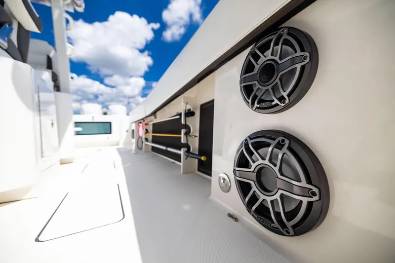 Mama Gato Yacht Photos Pics 2022 World Cat 400 CC-X boat interior with speakers, under a bright blue sky.