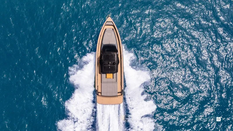 Available Now Yacht Photos Pics Aerial view of 2025 Pardo Yachts P50 cruising on vibrant blue ocean waters.