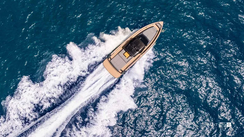 Available Now Yacht Photos Pics Aerial view of 2025 Pardo Yachts P50 cruising on vibrant blue ocean waters.