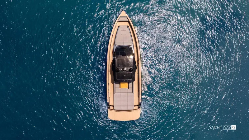 Available Now Yacht Photos Pics 2025 Pardo Yachts P50 cruising on clear blue water, aerial view.