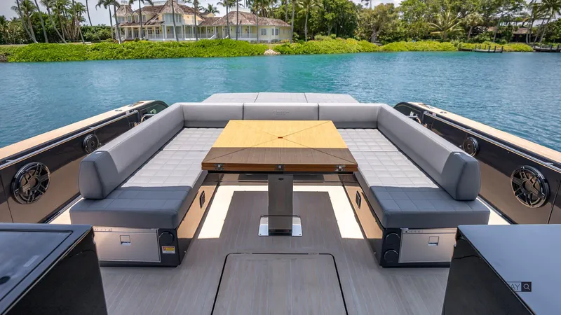 Available Now Yacht Photos Pics Luxurious seating area on 2025 Pardo Yachts P50, overlooking serene waterfront scenery.