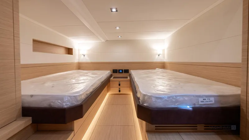 Available Now Yacht Photos Pics Luxurious interior cabin of 2025 Pardo Yachts P50 with twin beds and modern lighting.