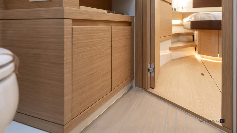 Available Now Yacht Photos Pics Interior of 2025 Pardo Yachts P50, featuring sleek wooden cabinetry and modern design.