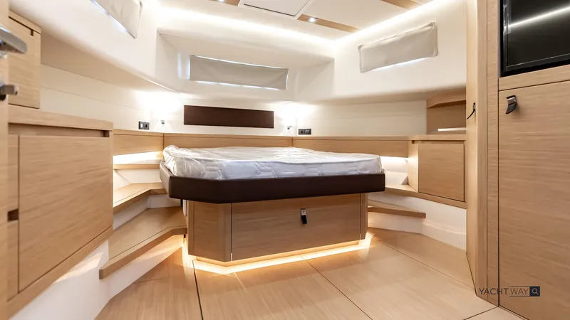 Available Now Yacht Photos Pics Luxurious interior of 2025 Pardo Yachts P50 with modern wood finish and ambient lighting.