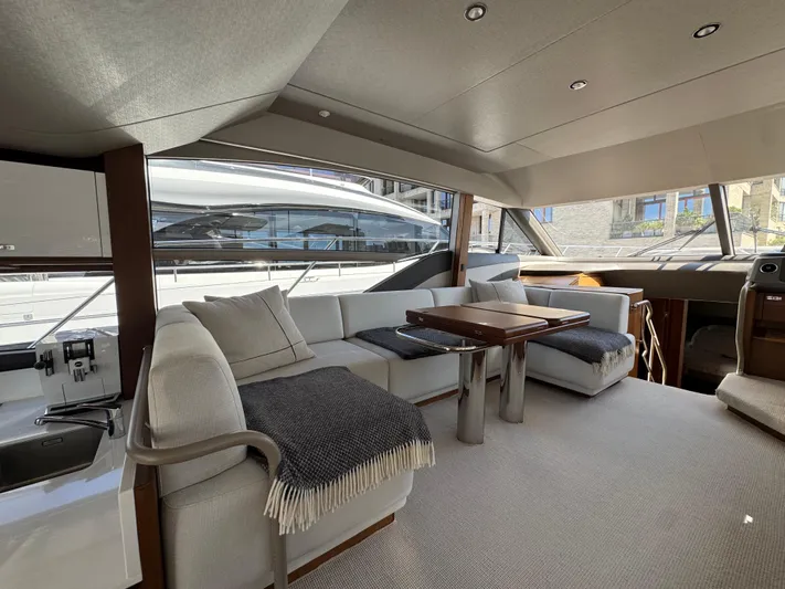 Yacht Photos Pics Luxurious interior of 2020 Princess F55 yacht with elegant seating and modern design.