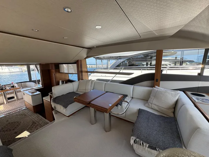  Yacht Photos Pics Luxurious interior of 2020 Princess F55 yacht with elegant seating and modern design.