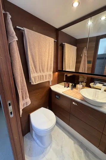  Yacht Photos Pics Luxurious bathroom in 2020 Princess F55 yacht with modern fixtures and elegant design.