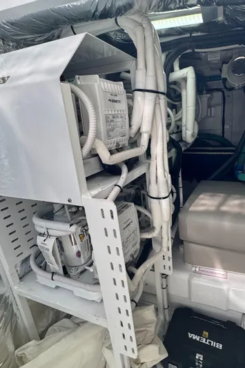  Yacht Photos Pics Engine room of 2020 Princess F55 yacht with Dometic equipment and wiring.