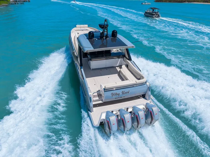 Why Knot Yacht Photos Pics Azimut 47 VERVE 2022 luxury yacht cruising on turquoise waters.