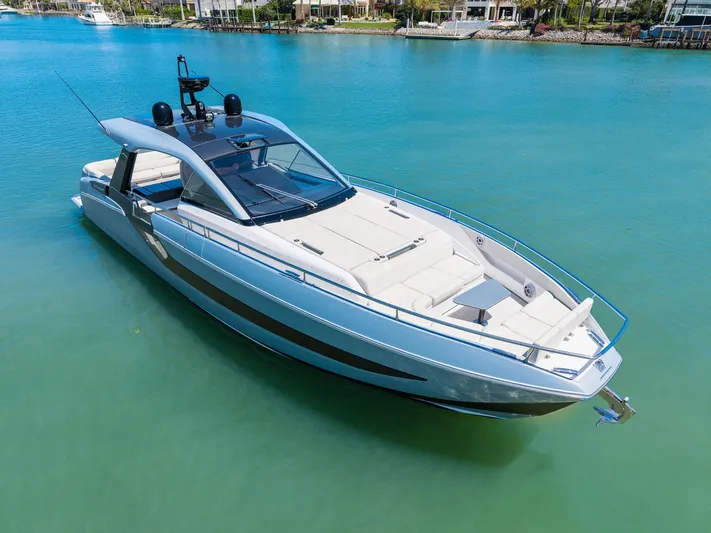 Why Knot Yacht Photos Pics 2022 Azimut 47 VERVE luxury yacht on turquoise water, showcasing sleek design and modern features.