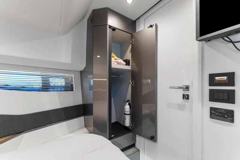 Why Knot Yacht Photos Pics Interior of 2022 Azimut 47 VERVE yacht with open cabinet and modern design.