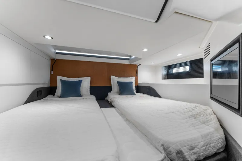 Why Knot Yacht Photos Pics Interior cabin of 2022 Azimut 47 VERVE yacht with twin beds and modern design.