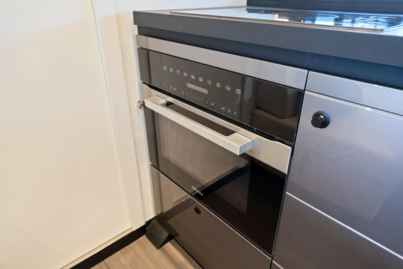 Why Knot Yacht Photos Pics Modern kitchen appliance in 2022 Azimut 47 VERVE yacht interior.