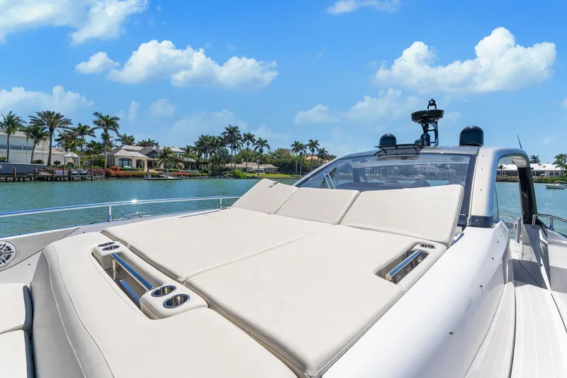 Why Knot Yacht Photos Pics Azimut 47 VERVE 2022 yacht with sunbathing deck, cruising on a sunny day.