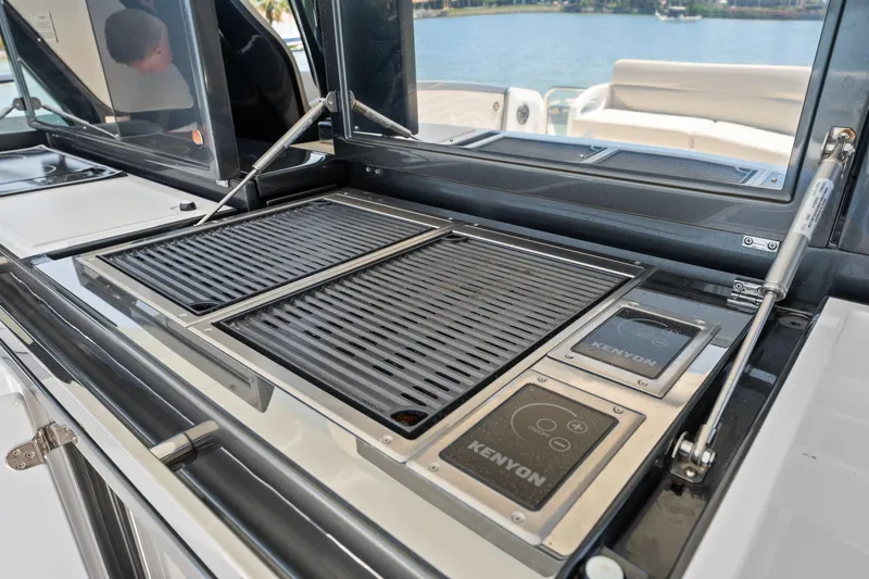 Why Knot Yacht Photos Pics Outdoor grill on 2022 Azimut 47 VERVE yacht, featuring Kenyon cooking appliances.