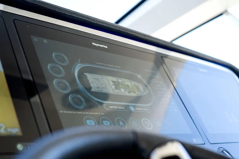 Why Knot Yacht Photos Pics Touchscreen control panel on 2022 Azimut 47 VERVE yacht, displaying navigation interface.