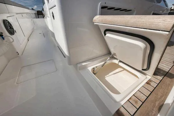  Yacht Photos Pics 2023 Valhalla Boatworks V-46 deck with open storage compartment.