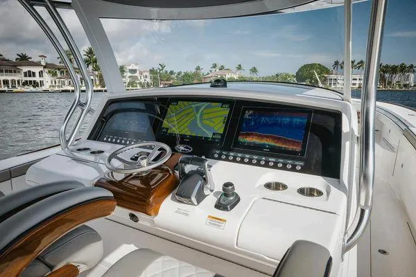  Yacht Photos Pics 2023 Valhalla Boatworks V-46 helm with advanced navigation displays and luxurious seating.