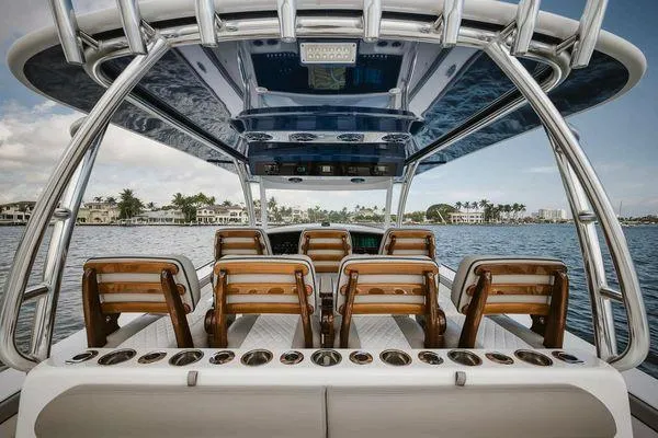 Yacht Photos Pics 2023 Valhalla Boatworks V-46 interior with luxurious seating and ocean view.