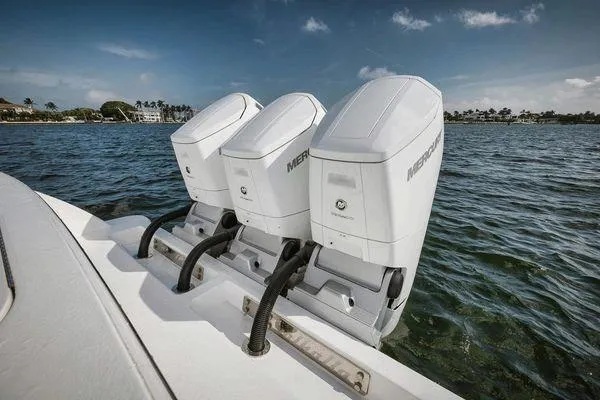  Yacht Photos Pics 2023 Valhalla Boatworks V-46 with triple Mercury outboard engines on water.