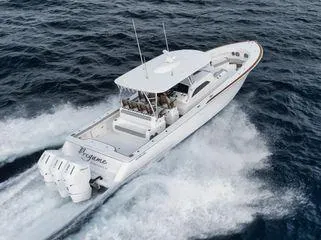  Yacht Photos Pics 2023 Valhalla Boatworks V-46 cruising on open water, aerial view.