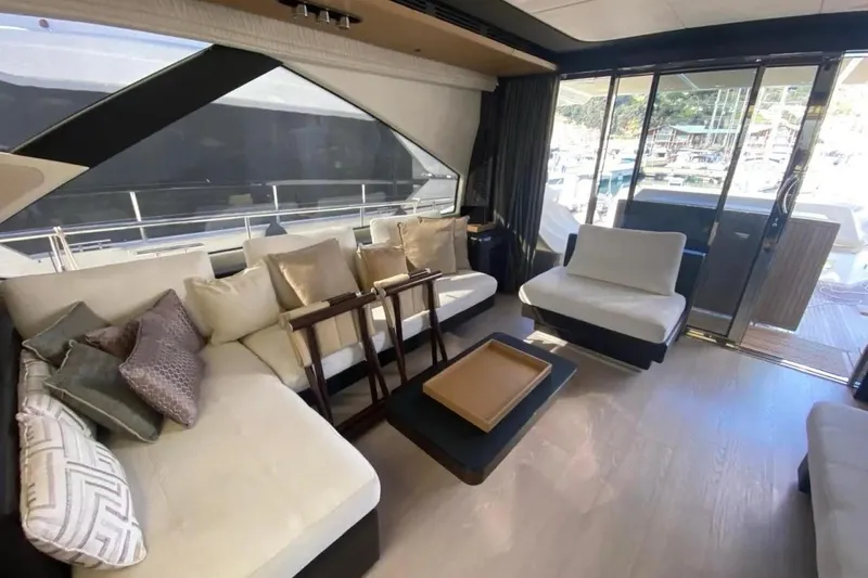 Titta Yacht Photos Pics Luxurious interior of 2016 Azimut 77S yacht with elegant seating and modern decor.